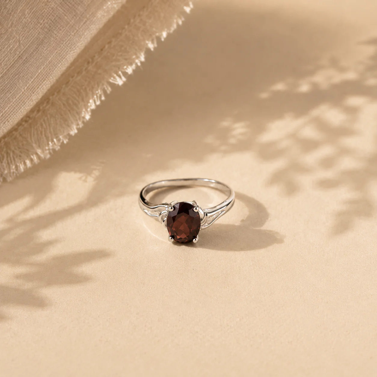 Oval Garnet Solitaire Ring